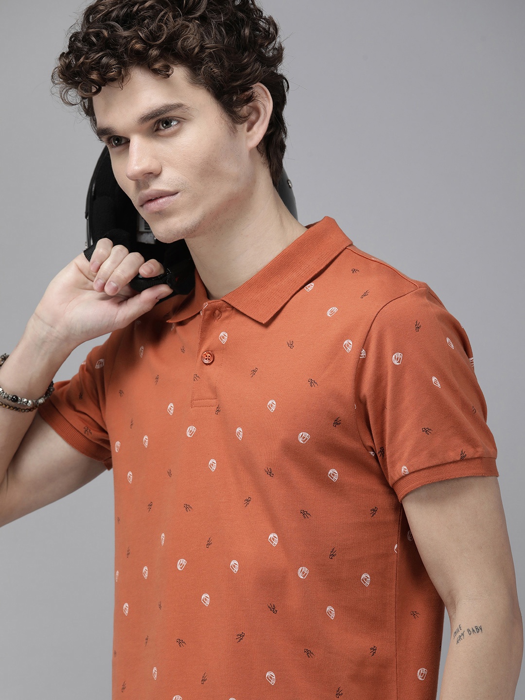 

Roadster Men Rust Orange Geometric Printed Polo Collar Pure Cotton T-shirt