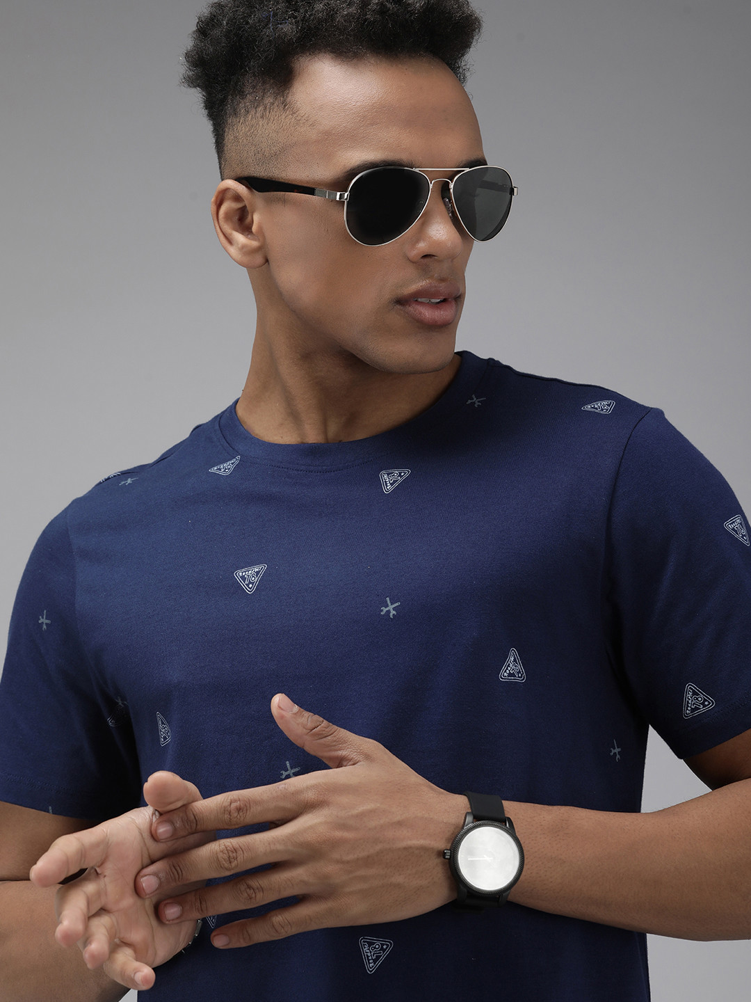

The Roadster Lifestyle Co Men Navy Blue & White Conversational Printed Pure Cotton T-shirt