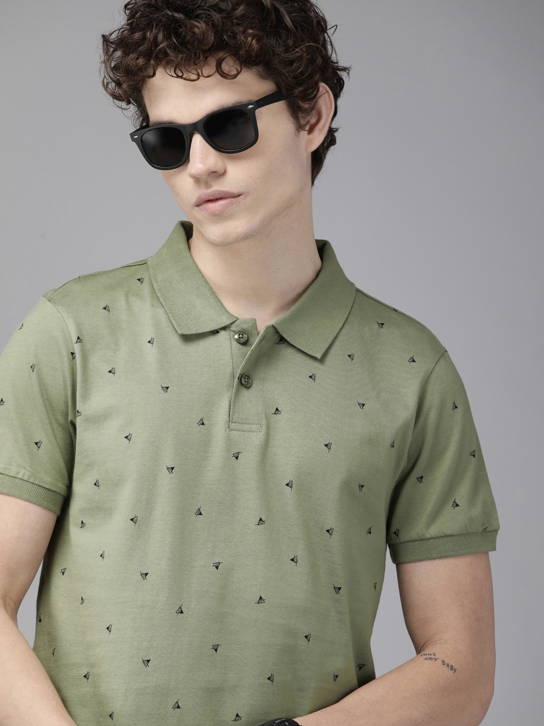 

The Roadster Lifestyle Co. Men Green & Black Printed Polo Collar Pure Cotton T-shirt