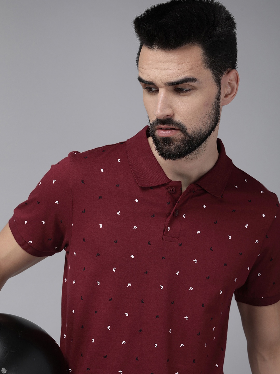 

The Roadster Lifestyle Co Men Maroon Geometric Printed Polo Collar Pure Cotton T-shirt