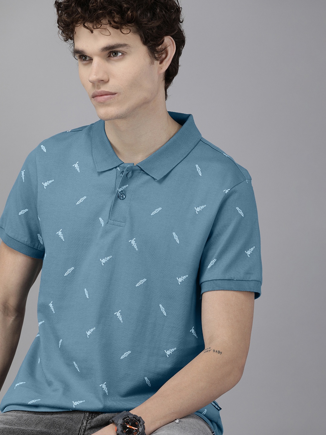 

The Roadster Lifestyle Co Men Blue & White Printed Pure Cotton Polo Collar T-shirt