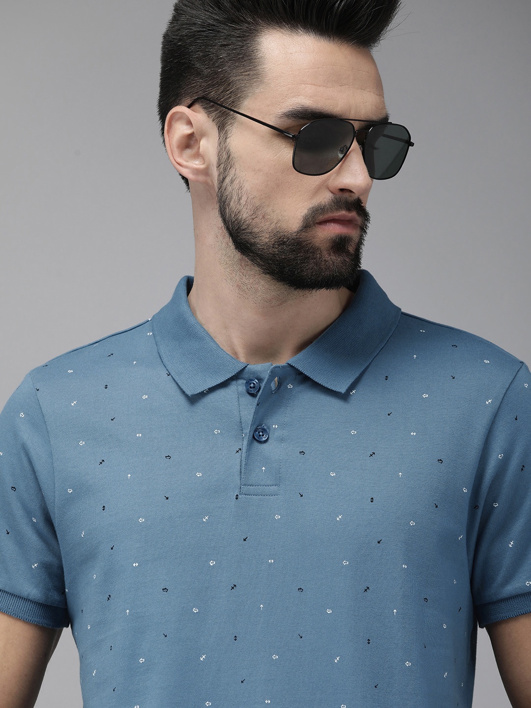 

The Roadster Lifestyle Co Men Blue & Black Printed Polo Collar Pure Cotton T-shirt