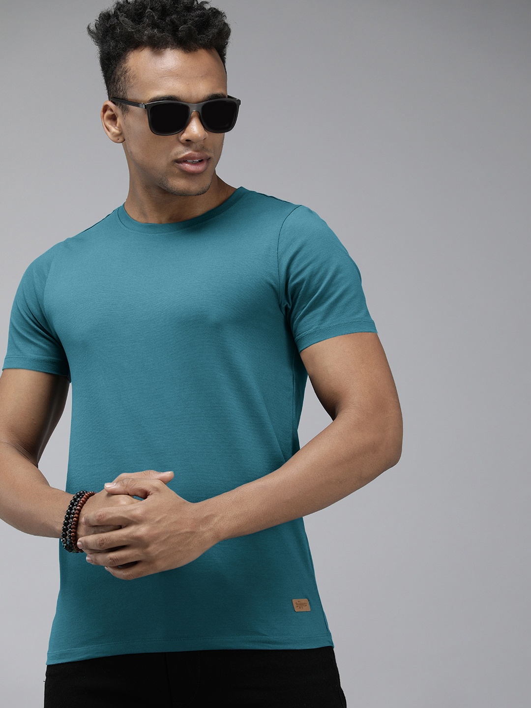 

Roadster Men Blue Solid Muscle Fit T-shirt