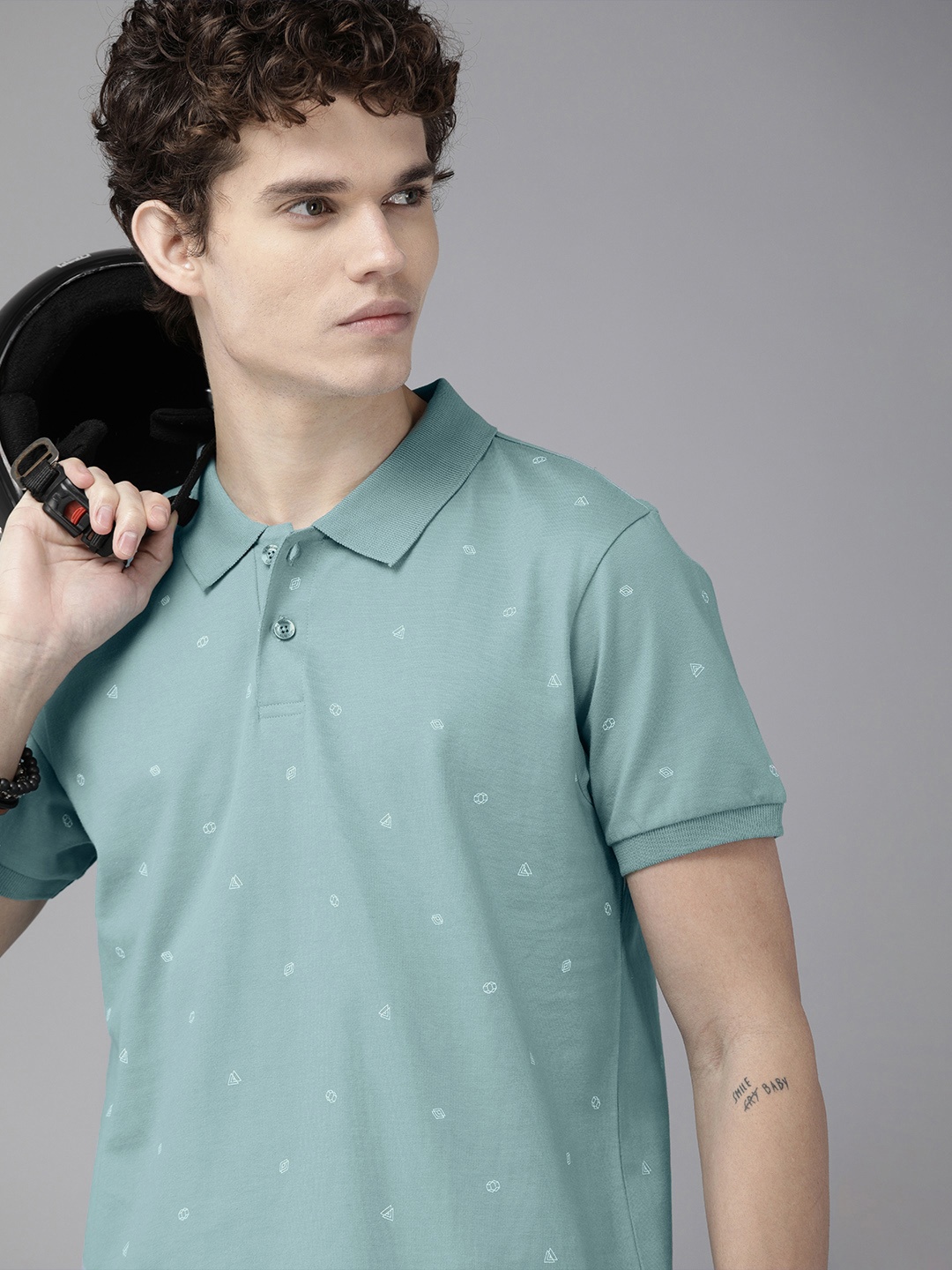 

The Roadster Lifestyle Co Men Sea Green & White Printed Pure Cotton Polo Collar T-shirt