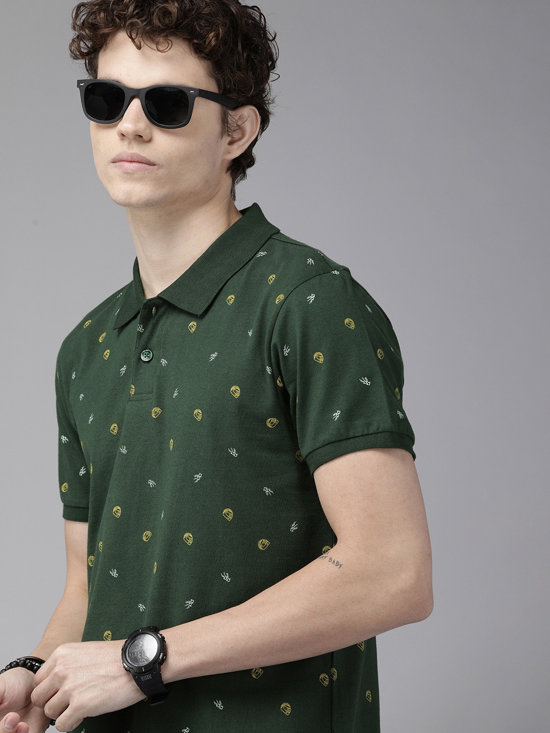 

The Roadster Lifestyle Co. Men Green & Yellow Printed Polo Collar Pure Cotton T-shirt