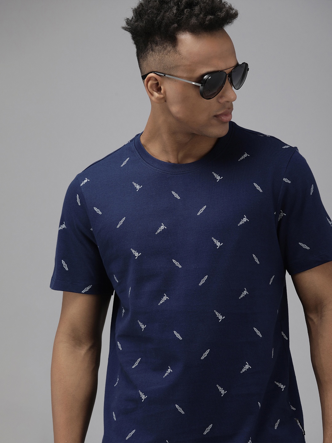 

The Roadster Lifestyle Co. Men Blue Printed Slim Fit Pure Cotton Casual T-shirt