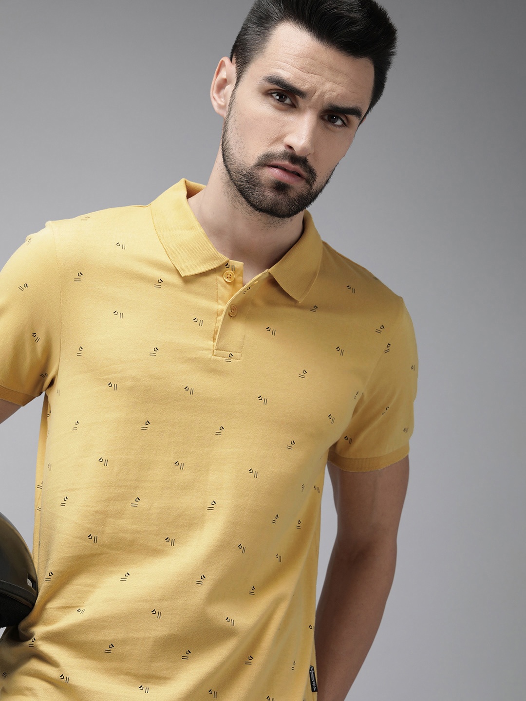 

The Roadster Lifestyle Co Men Yellow Printed Pure Cotton Polo Collar T-shirt
