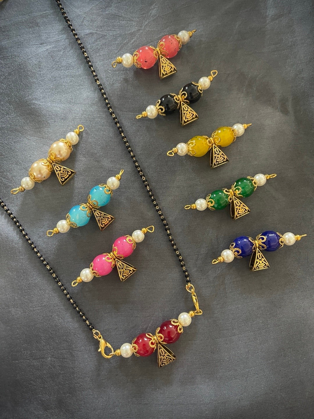 

Digital Dress Room Gold-Plated Black & Red Beaded Mangalsutra