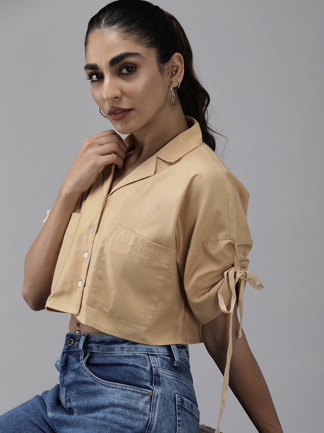 

The Roadster Lifestyle Co. Women Solid Boxy Pure Cotton Casual Crop Shirt, Beige