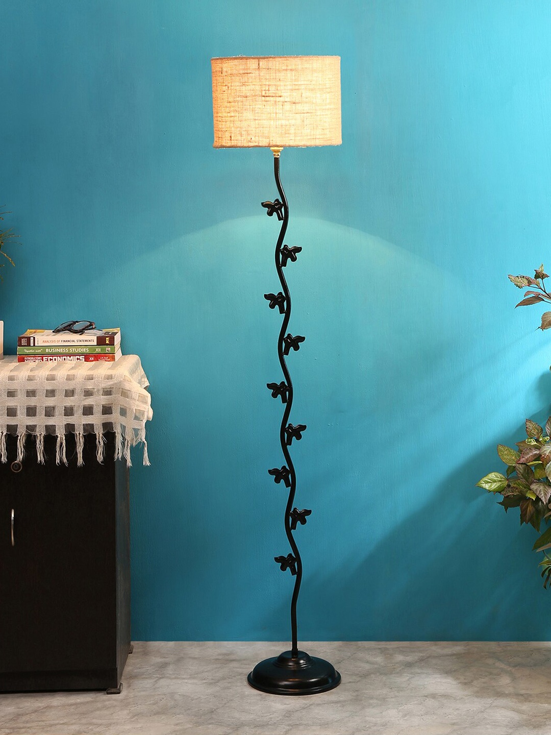 

Devansh Beige Solid Jute Cylindrical Shaped Leaf Club Lamp