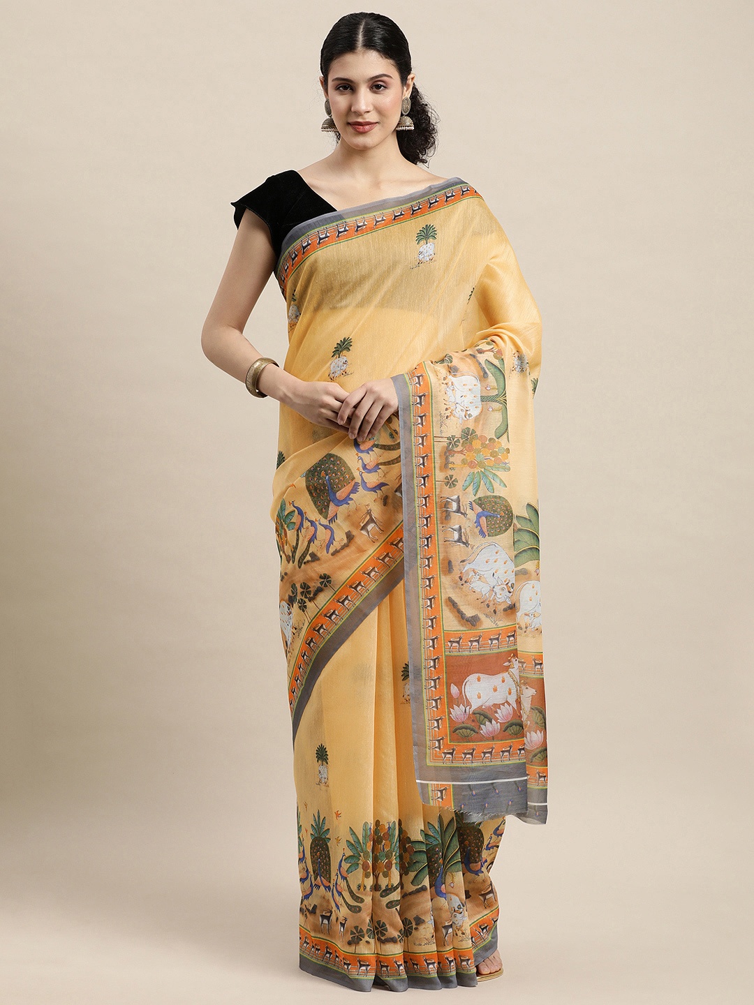 

SANGAM PRINTS Peach-Coloured Ethnic Motifs Saree