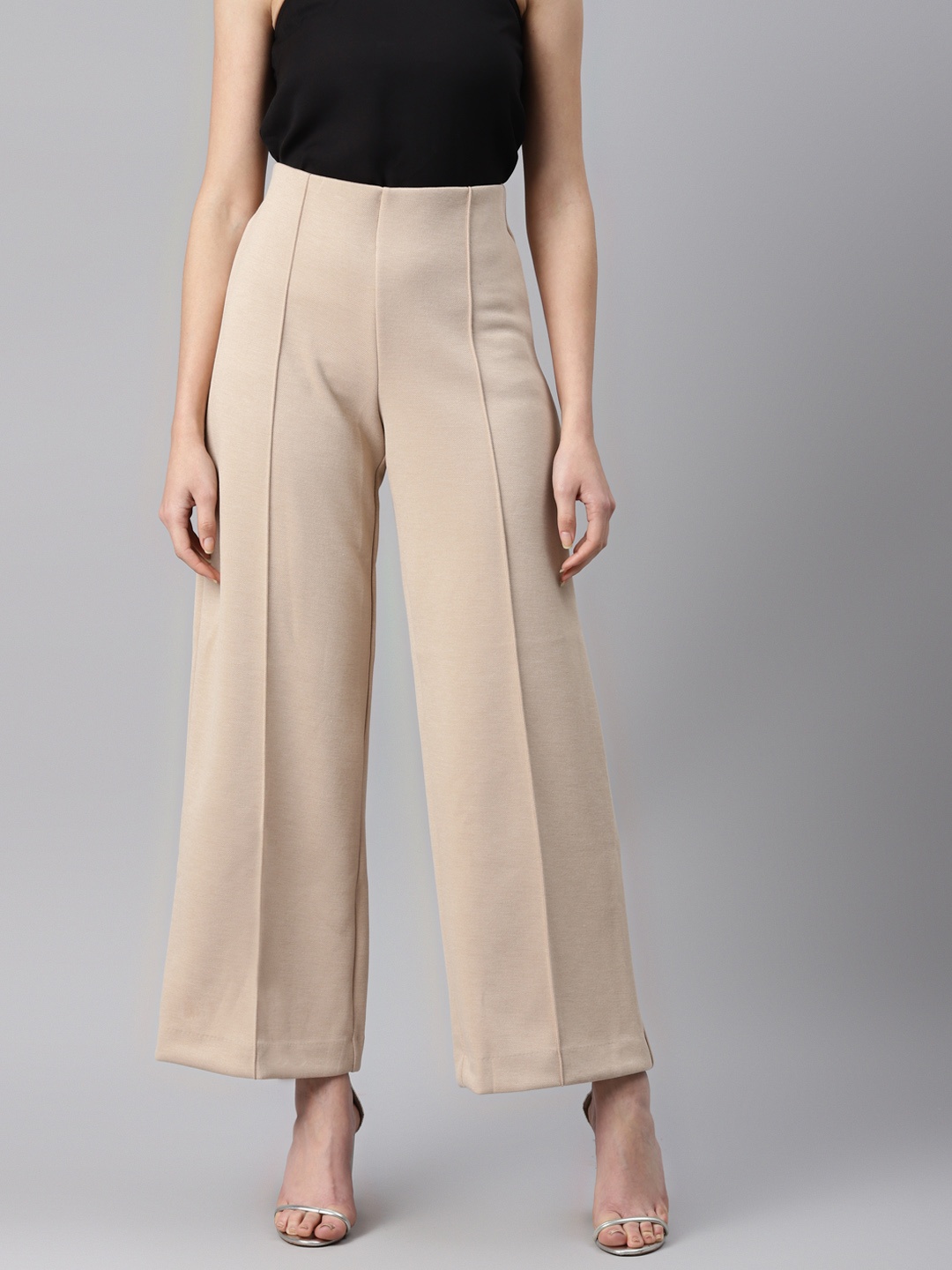 

Marks & Spencer Women Beige Solid Pleated Parallel Trousers