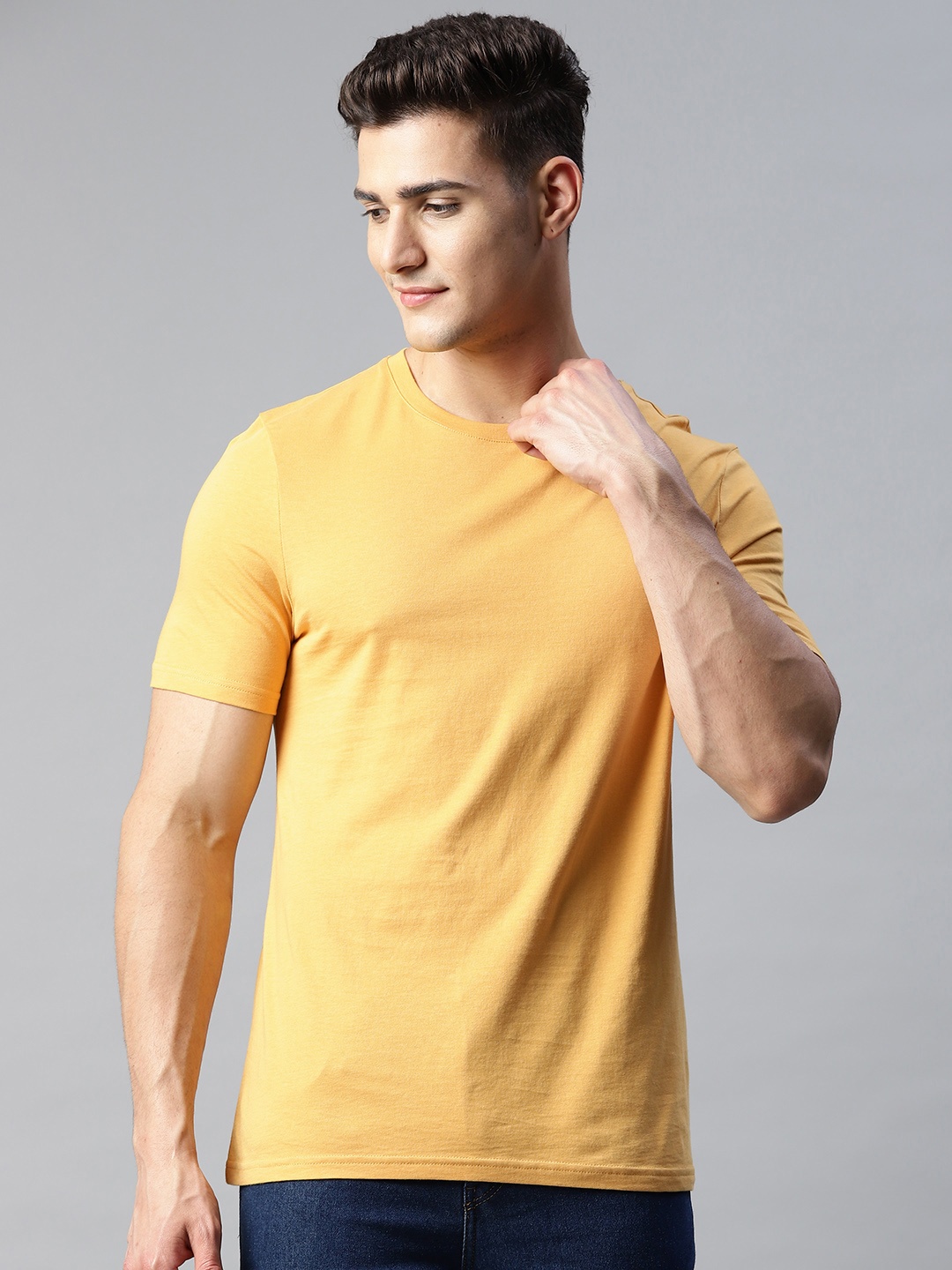 

Marks & Spencer Men Yellow Solid Cotton T-shirt