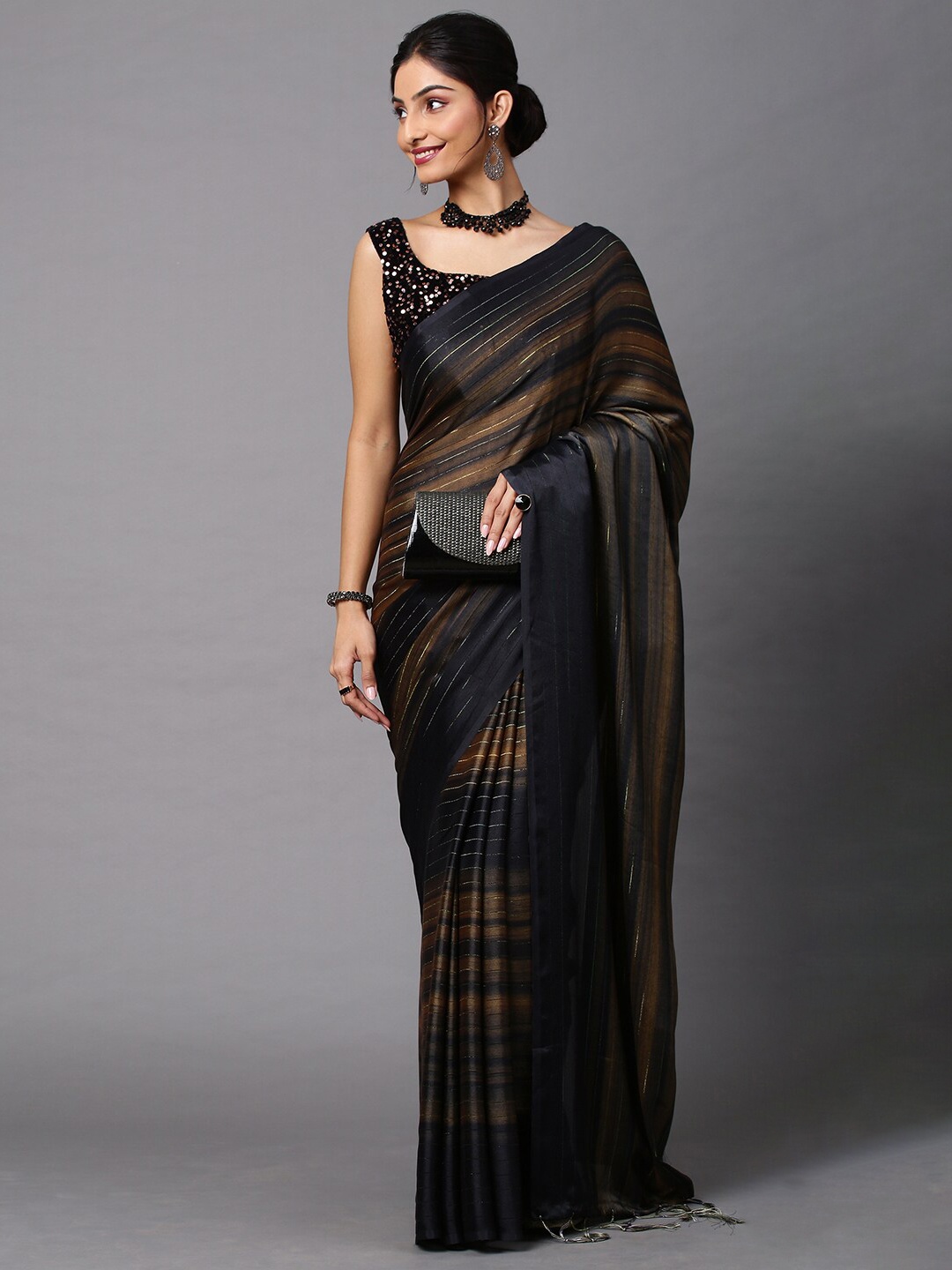 

Mitera Black & Tan Striped Party Wear Saree