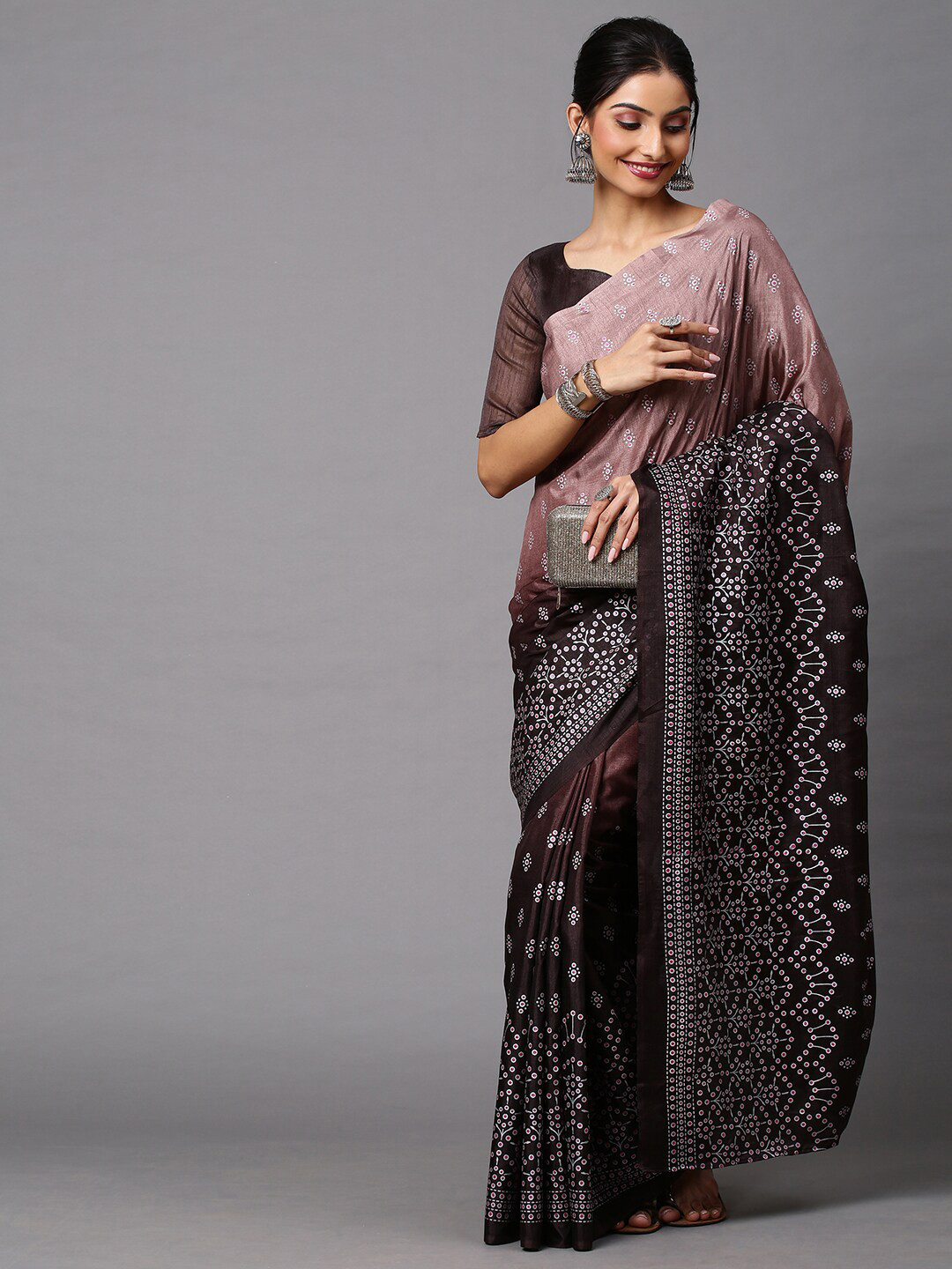 

Mitera Women Brown Ethnic Motifs Printed Dola Silk Sarees