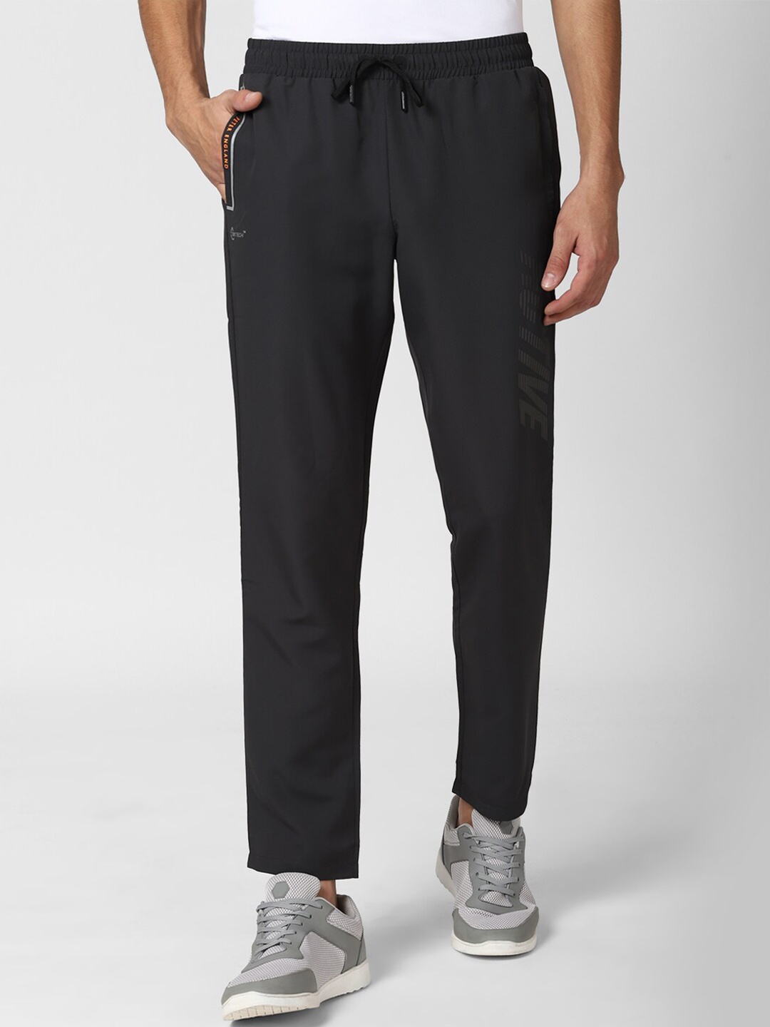 

Peter England Men Black Solid Track Pants