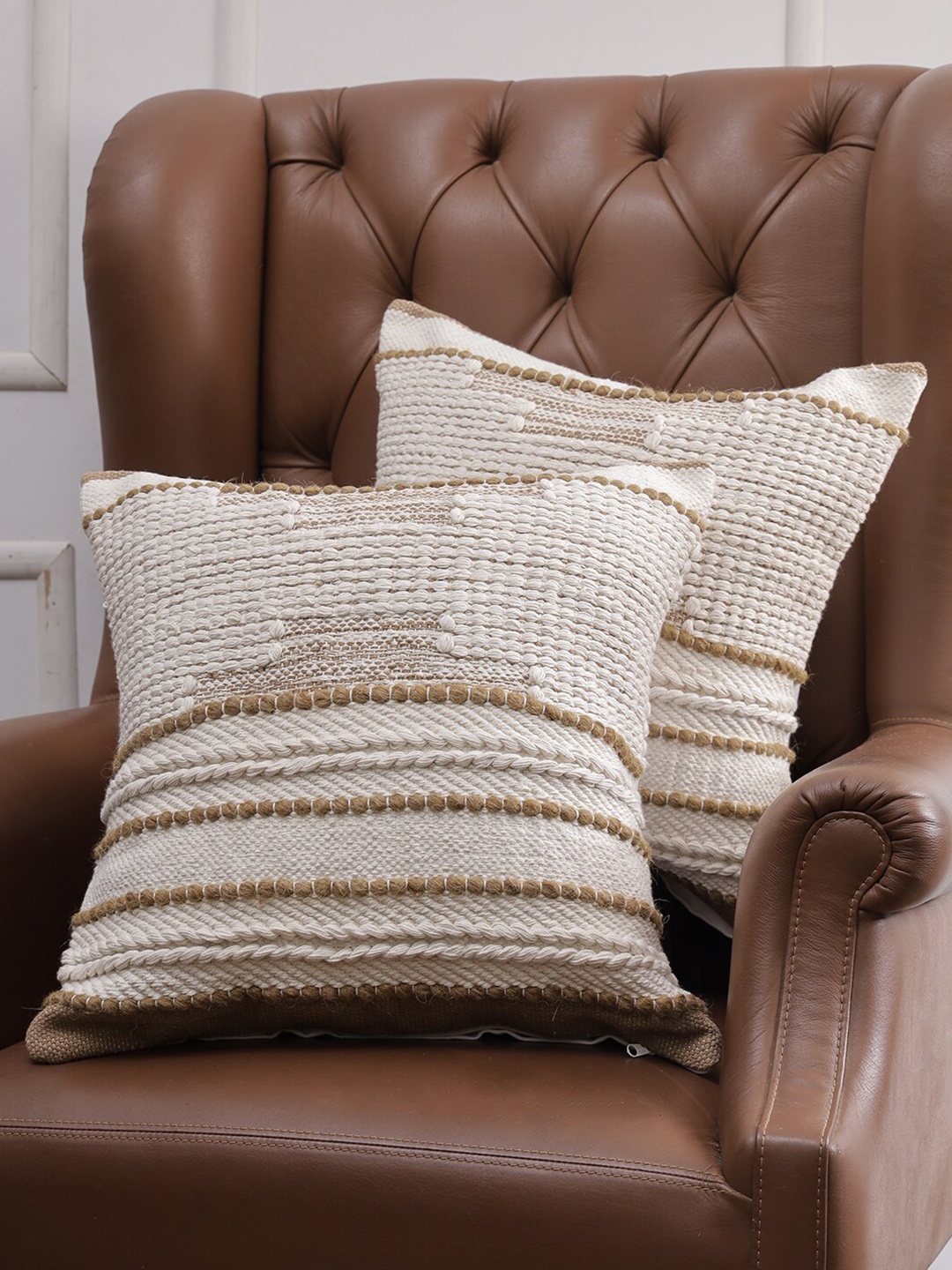 

Soumya White & Brown Set of 2 Self Design Square Cushion Covers