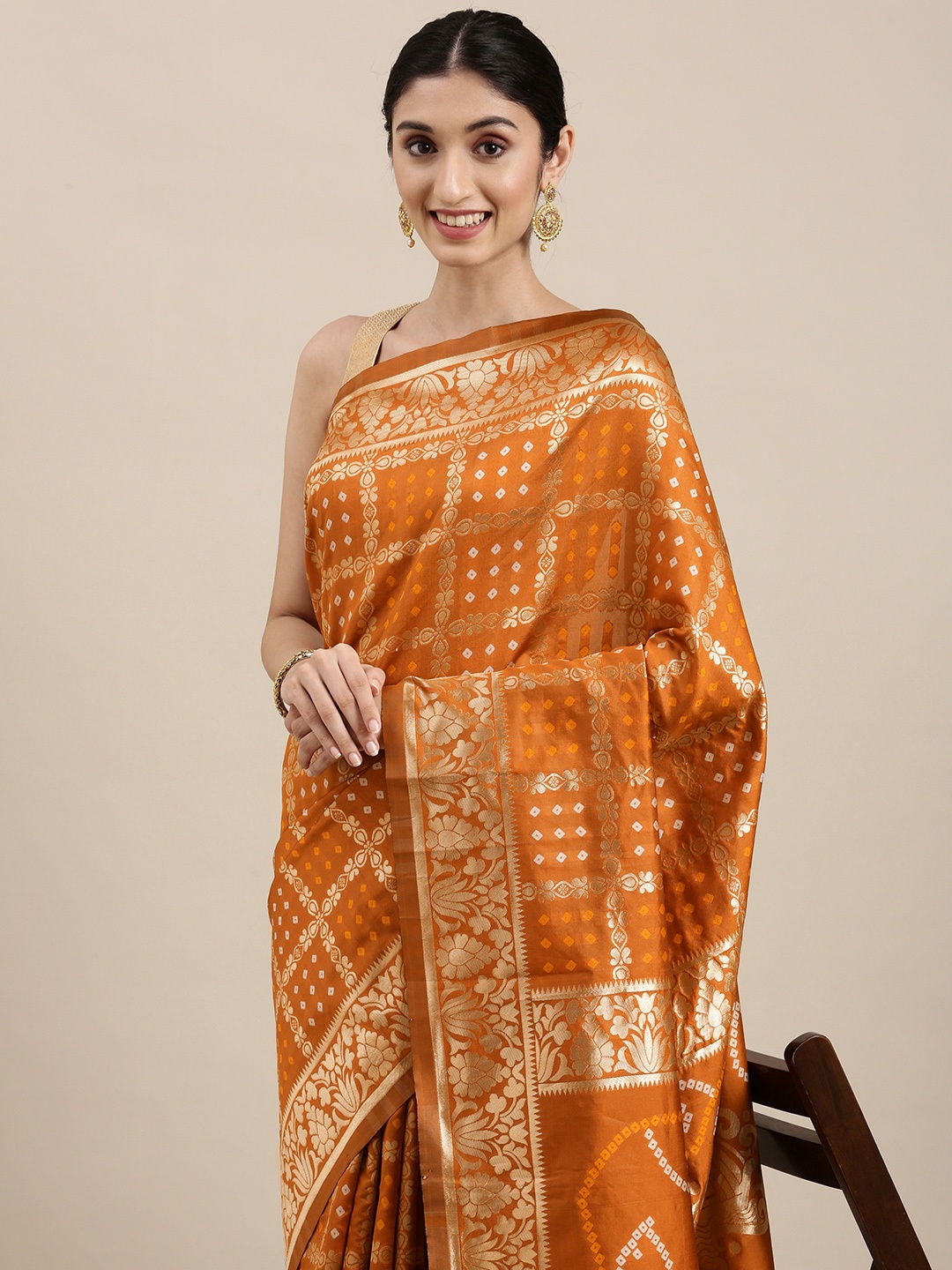 

Mitera Rust Orange & Golden Bandhani Silk Blend Bandhani Saree