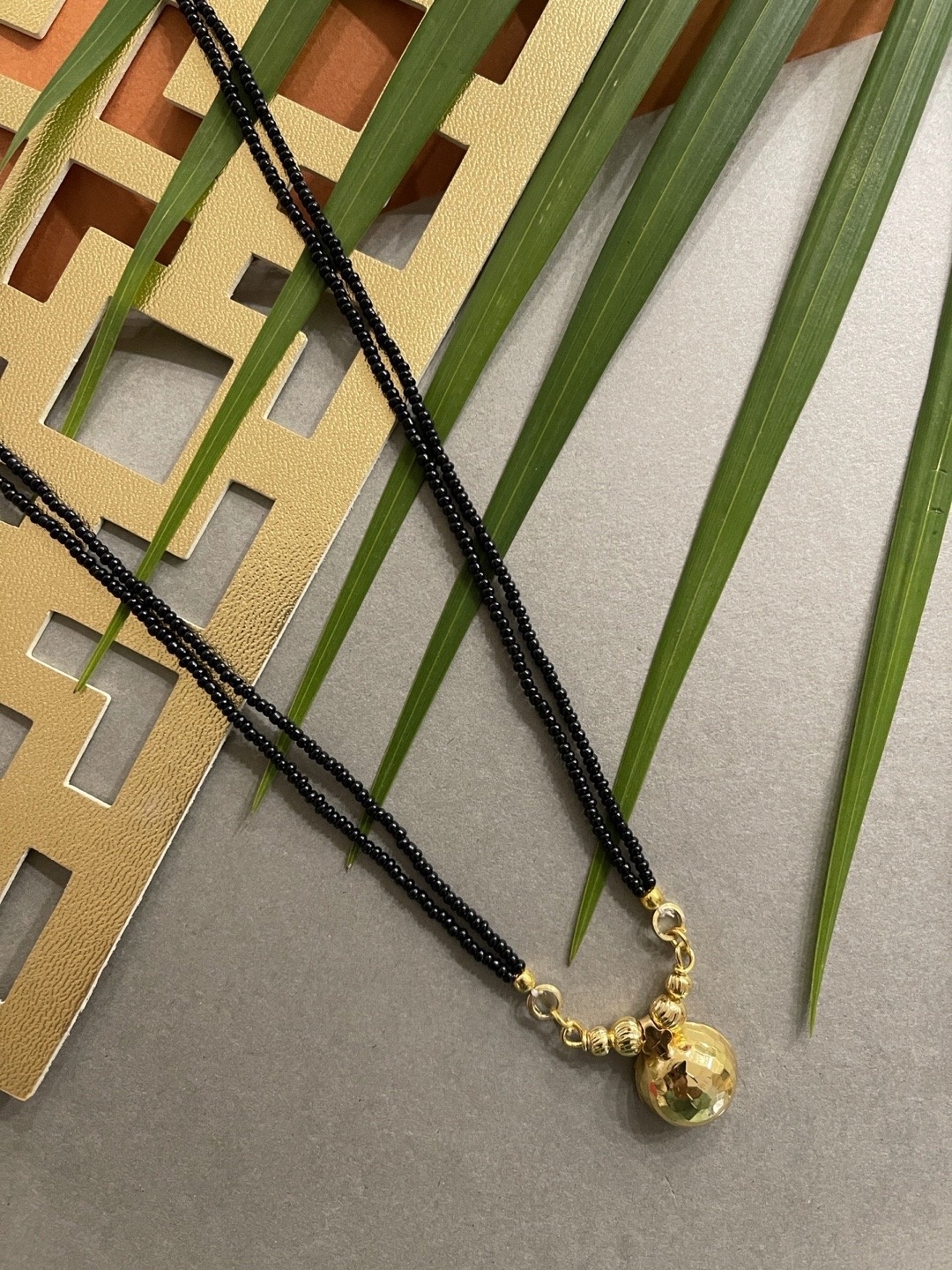 

Digital Dress Room Gold-Plated Black Beaded Mangalsutra