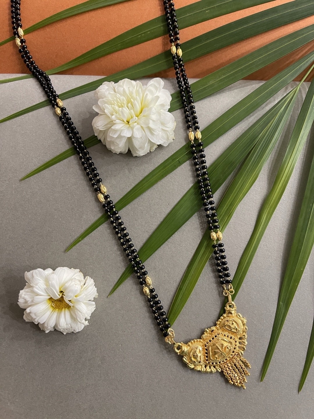 

Digital Dress Room Gold-Plated & Black Beaded Mangalsutra