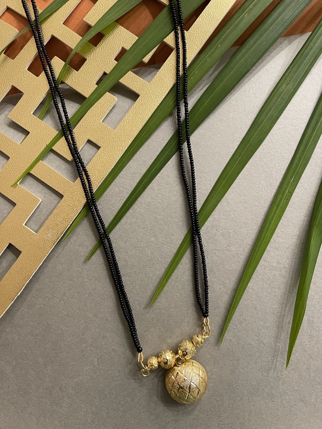 

Digital Dress Room Gold Plated Long Mangalsutra With Vati Black Beads