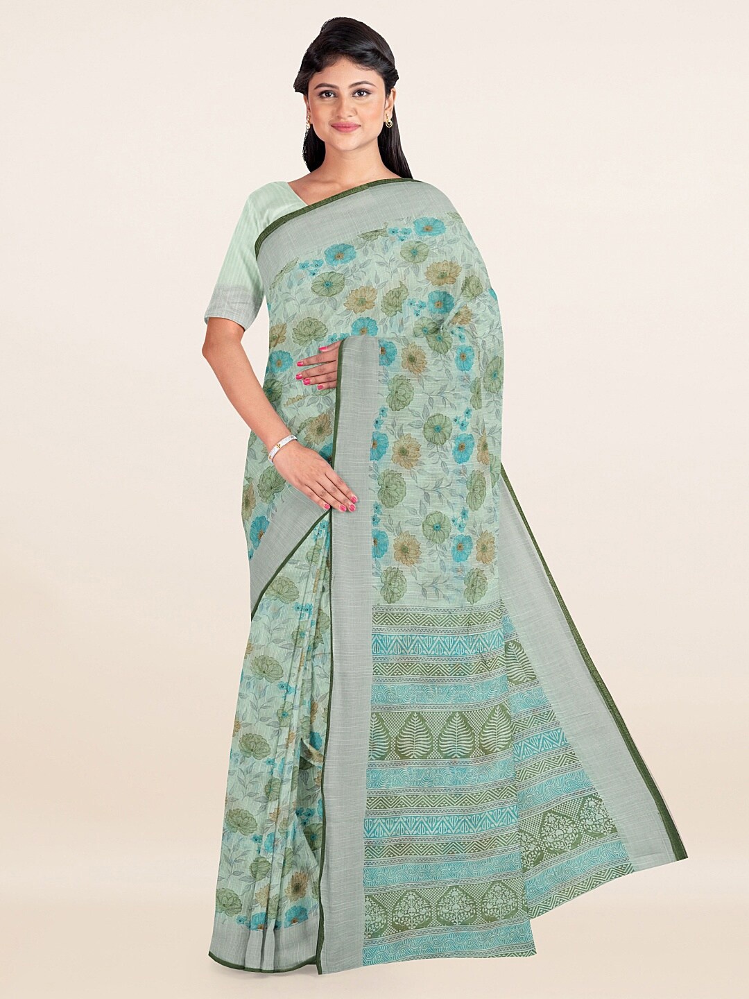 

Pothys Green & Blue Floral Zari Cotton Blend Saree