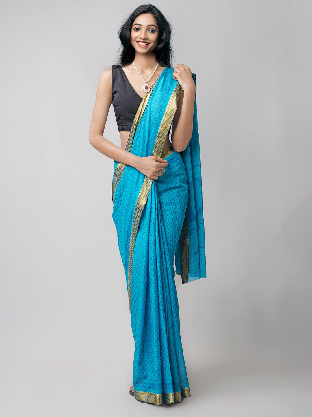 

Unnati Silks Green & Gold-Toned Ethnic Motifs Pure Cotton Block Print Saree