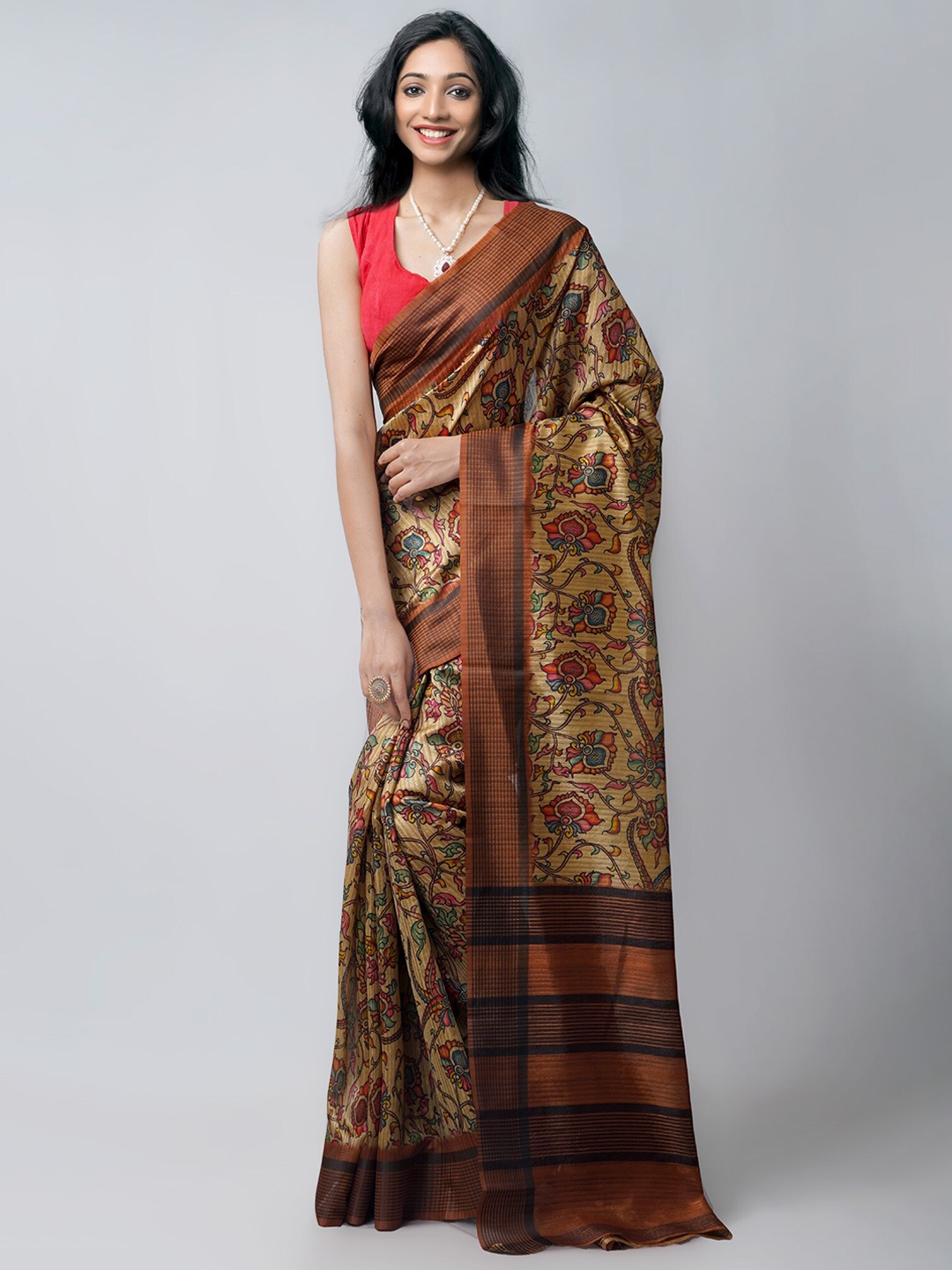 

Unnati Silks Brown & Blue Kalamkari Printed Jute Silk Saree