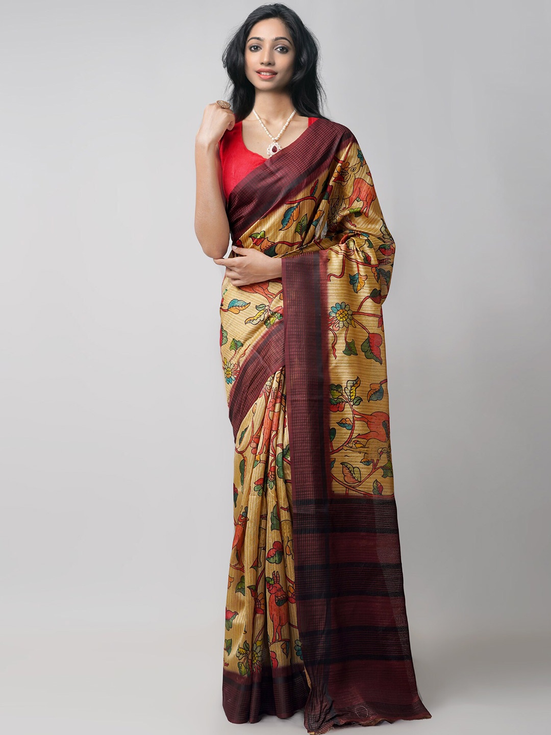 

Unnati Silks Brown & Blue Kalamkari Jute Silk Kanjeevaram Saree