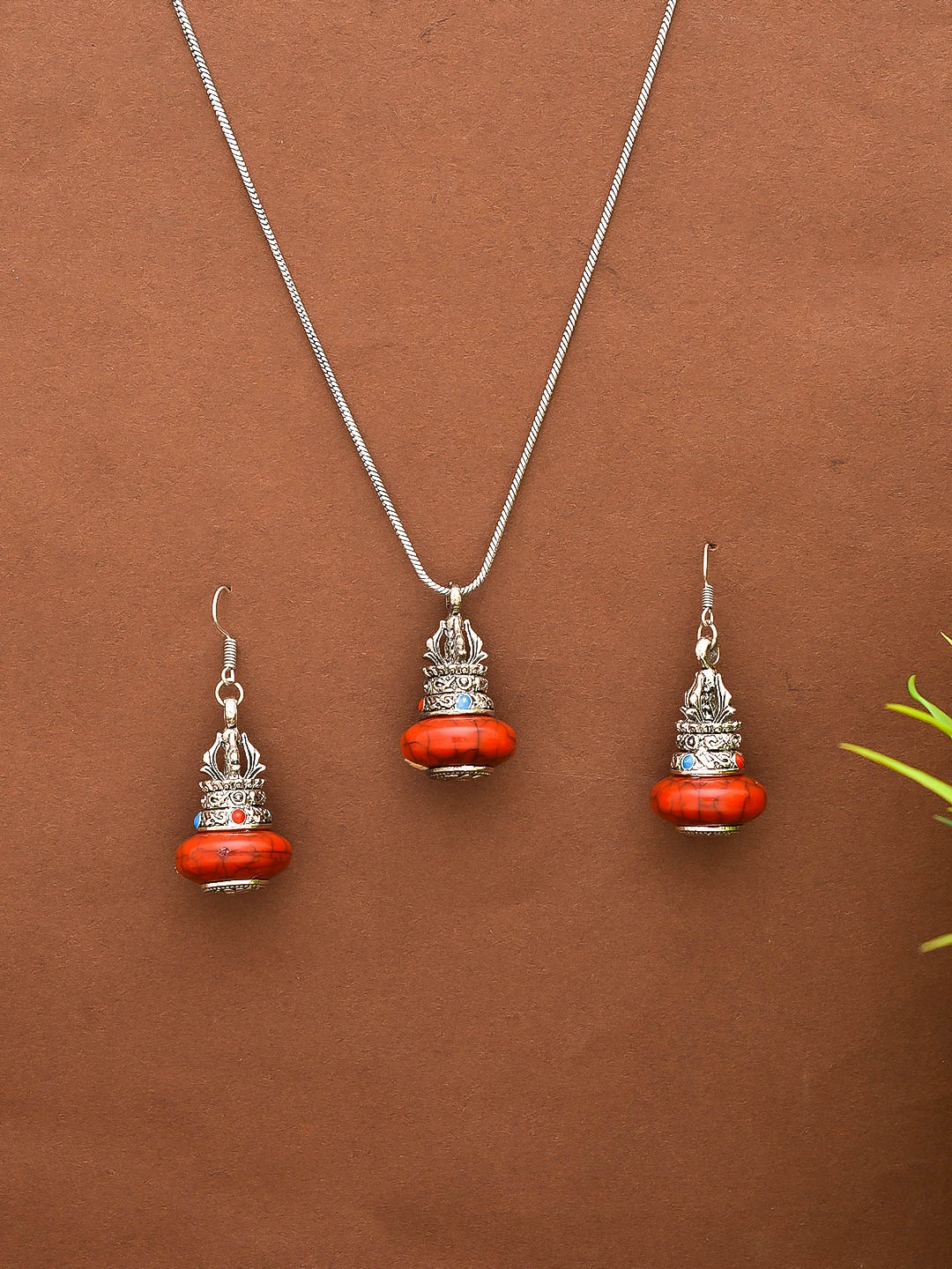 

Silvermerc Designs Oxidised Silver-Plated Red Stone-Studded Pendant Set