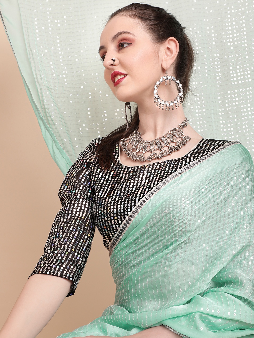 

Sangria Sea Green & Silver-Toned Striped Sequinned Pure Georgette Saree