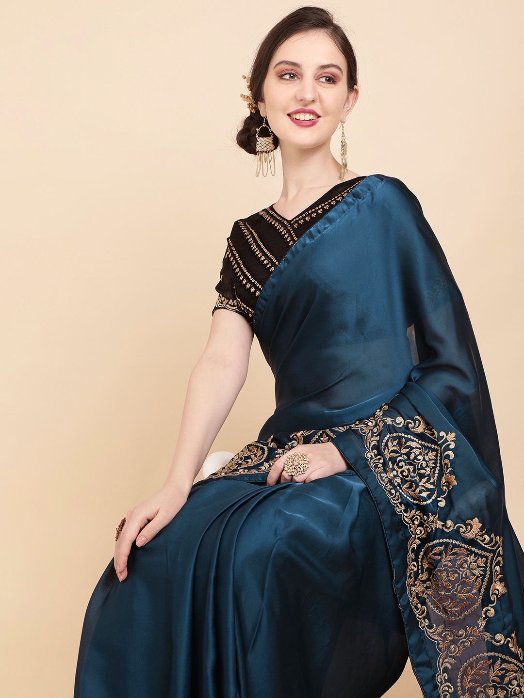 

Sangria Teal & Gold-Toned Ethnic Motifs Satin Saree