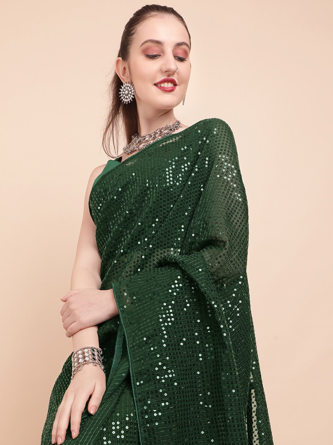 

Sangria Olive Green Embellished Sequinned Pure Georgette Saree