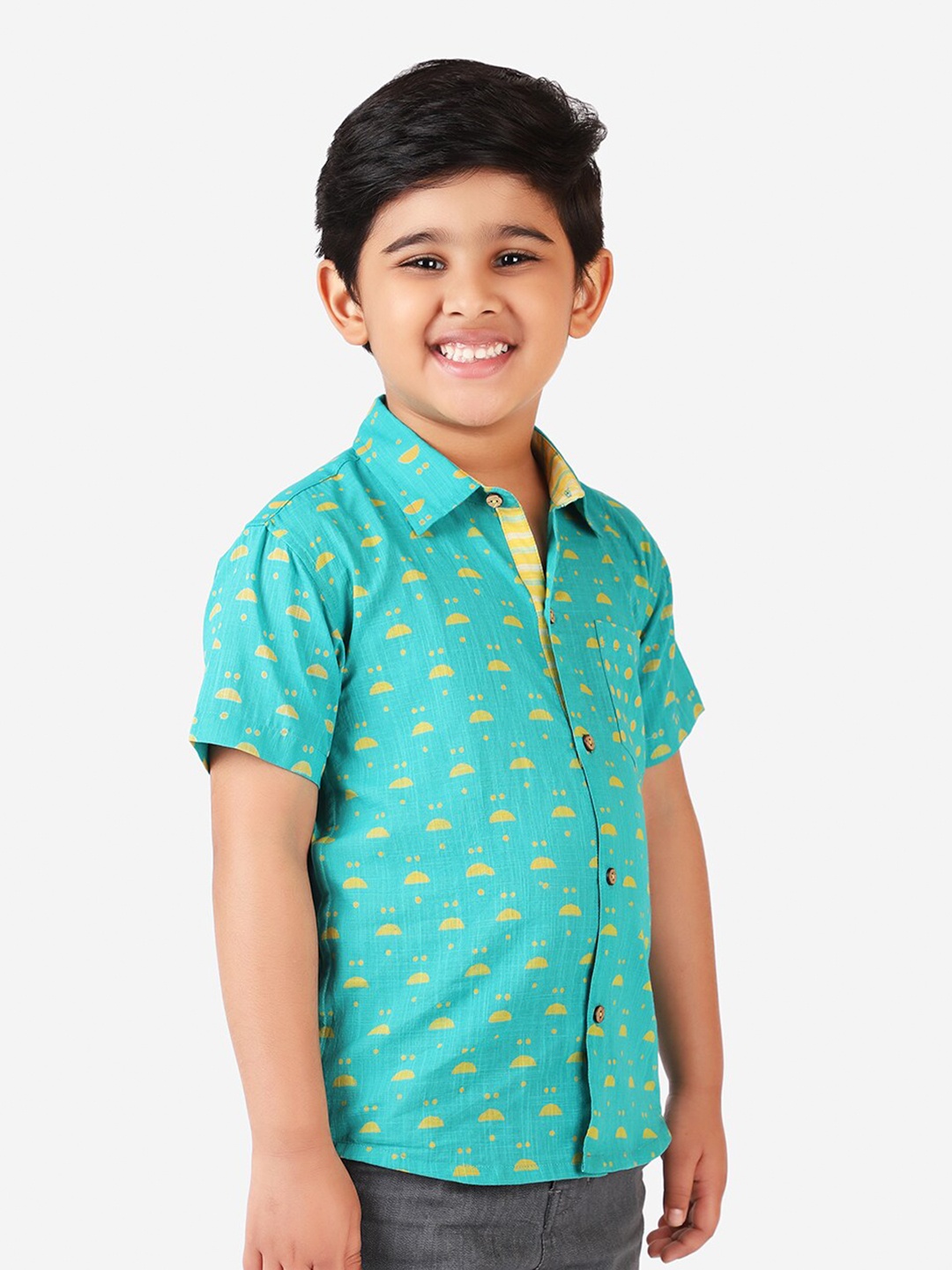 

Fabindia Boys Turquoise Blue & Yellow Block Printed Cotton Slub Casual Shirt