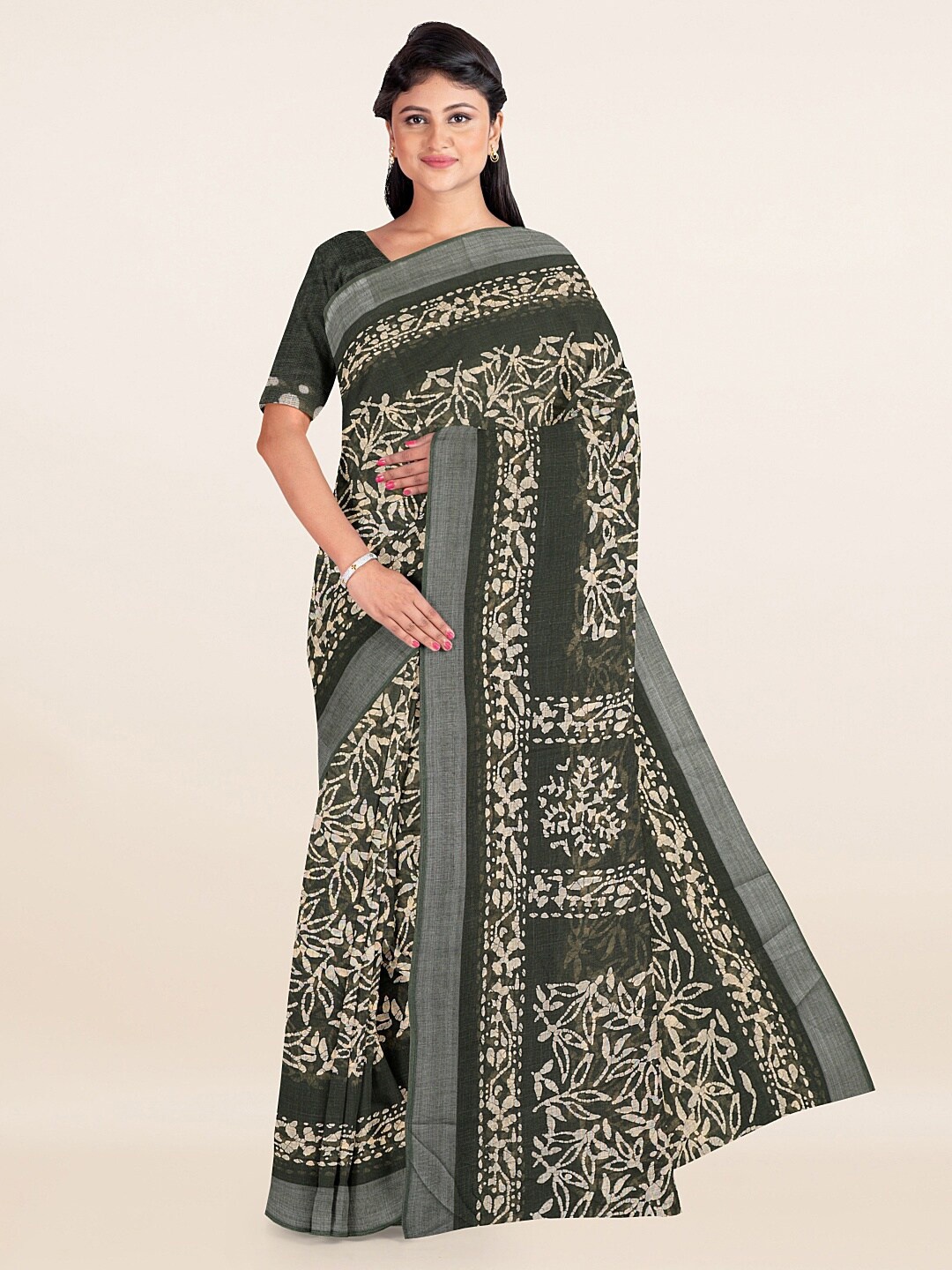 

Pothys Green & Beige Floral Zari Linen Blend Saree