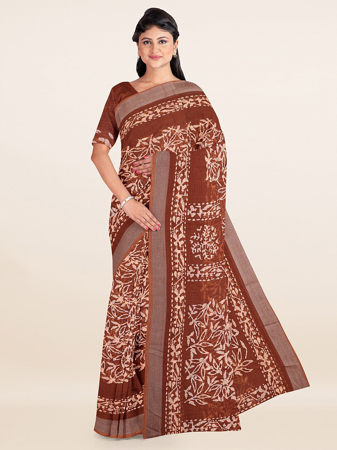 

Pothys Brown & Beige Floral Zari Linen Blend Saree