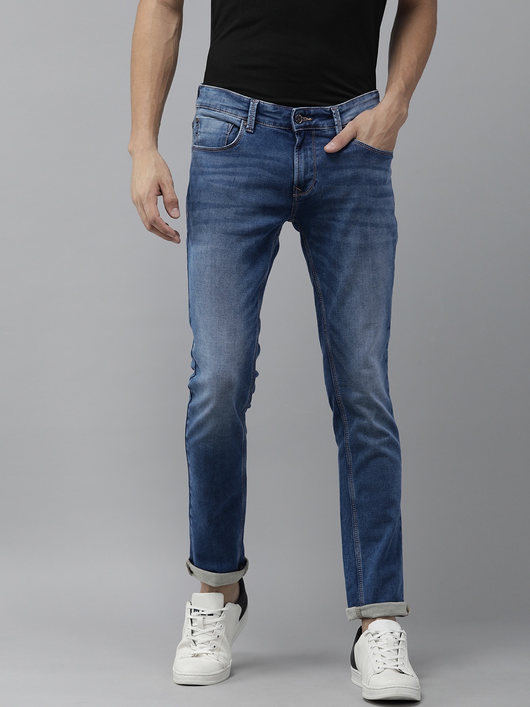 

SPYKAR Men Blue Tapered Fit Low-Rise Light Fade Stretchable Jeans