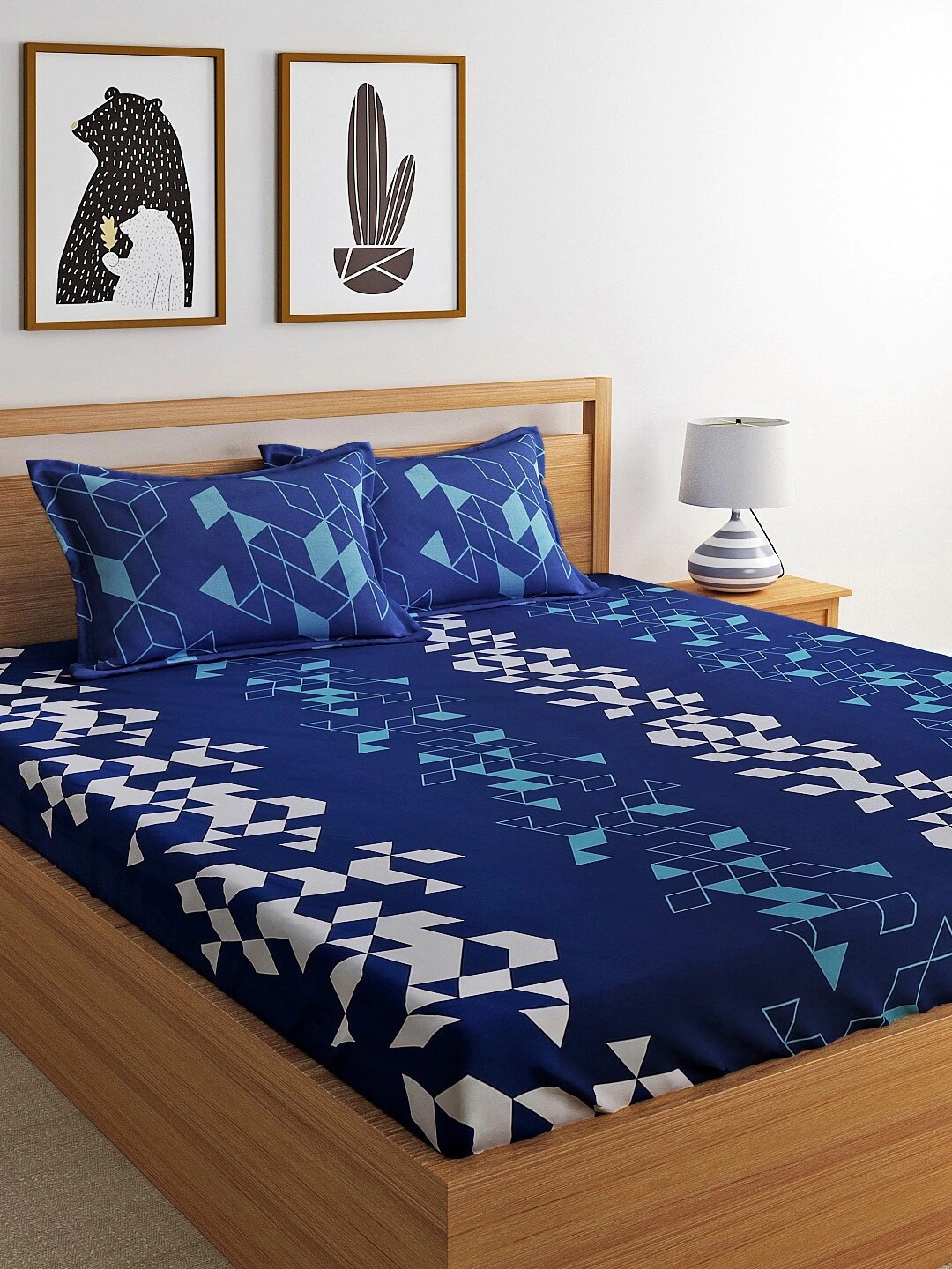 

Dreamscape Blue & White Geometric 144 TC King Cotton Bedsheet with 2 Pillow Covers