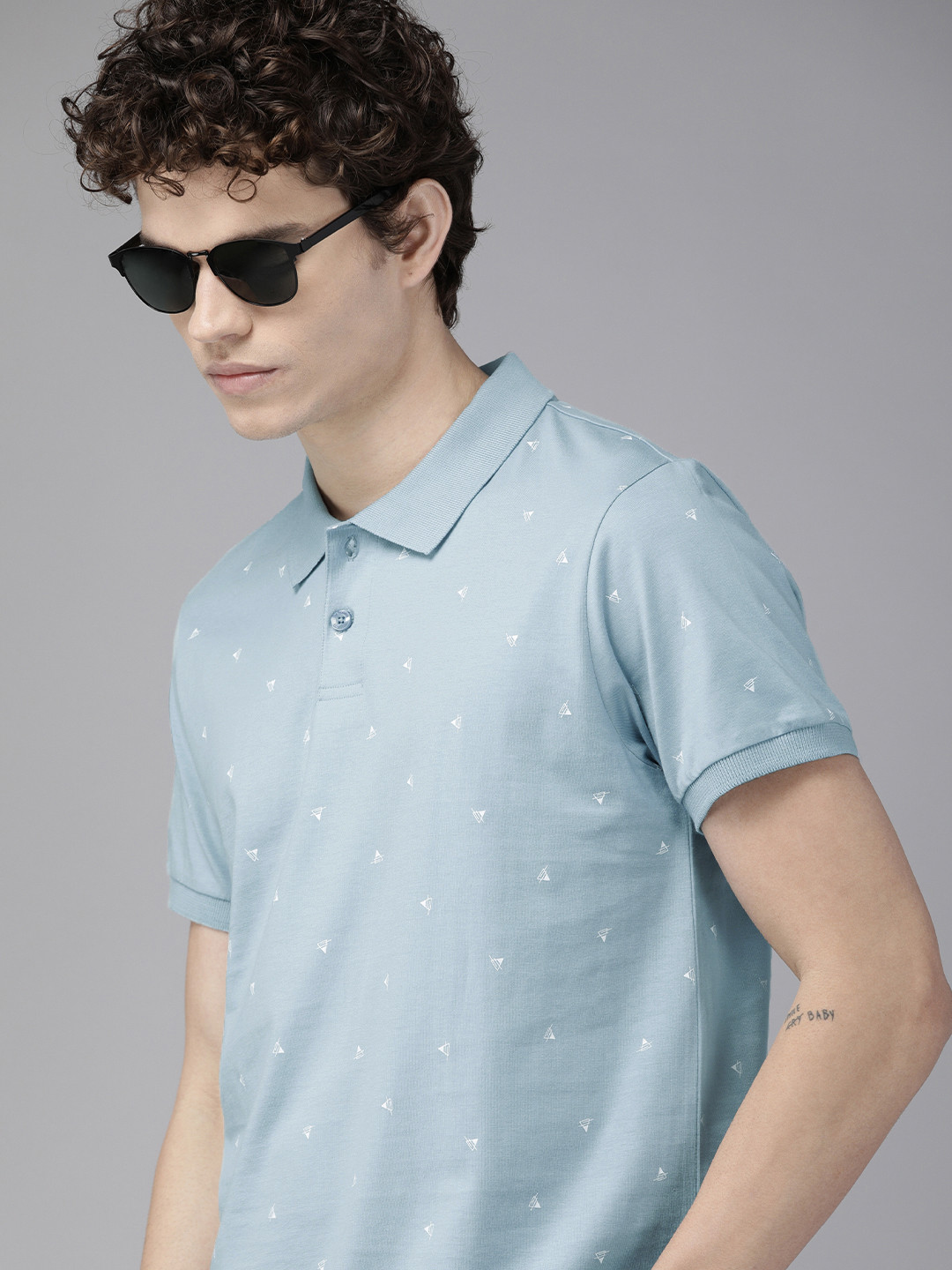 

The Roadster Lifestyle Co Men Blue & White Printed Pure Cotton Polo Collar T-shirt
