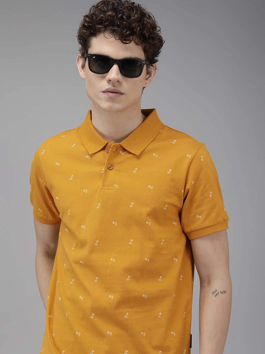 

Roadster Men Mustard Yellow & White Printed Polo Collar T-shirt