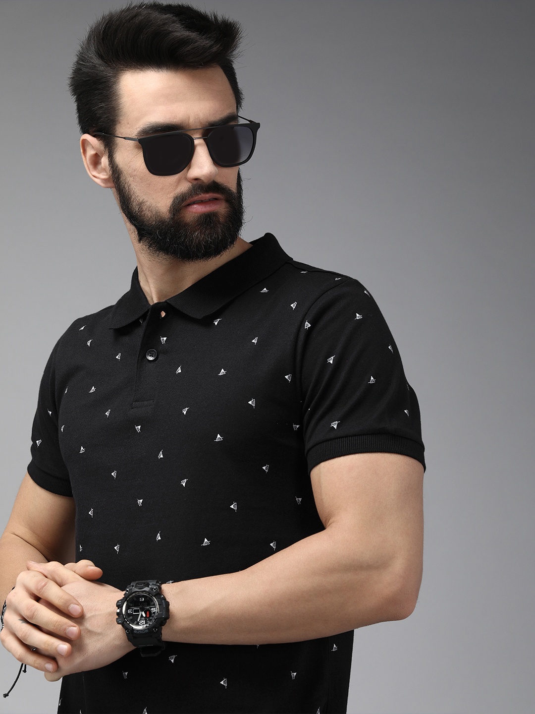 

The Roadster Lifestyle Co Men Black Printed Pure Cotton Polo Collar T-shirt
