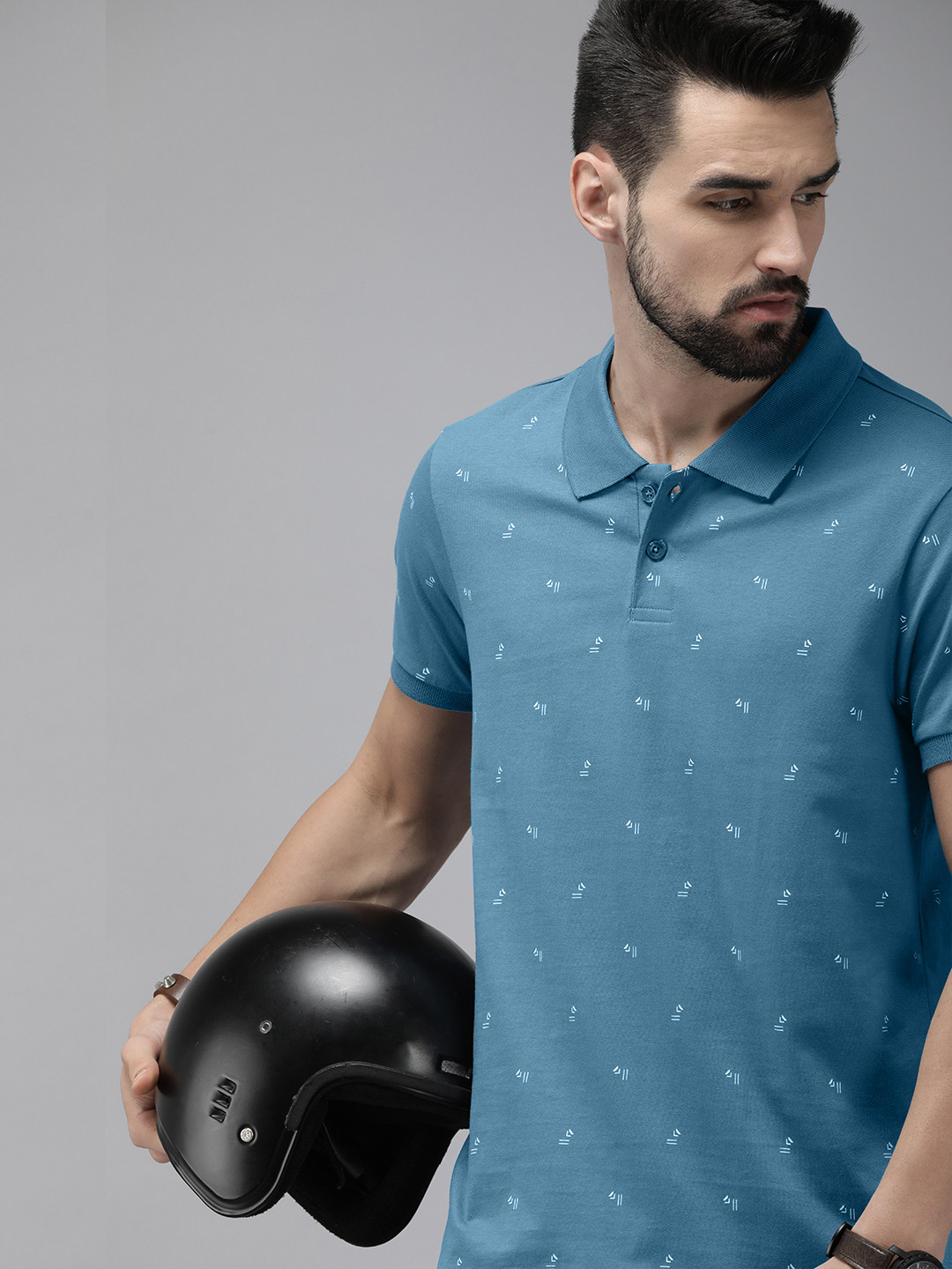 

The Roadster Lifestyle Co Men Blue & White Printed Polo Collar Pure Cotton T-shirt