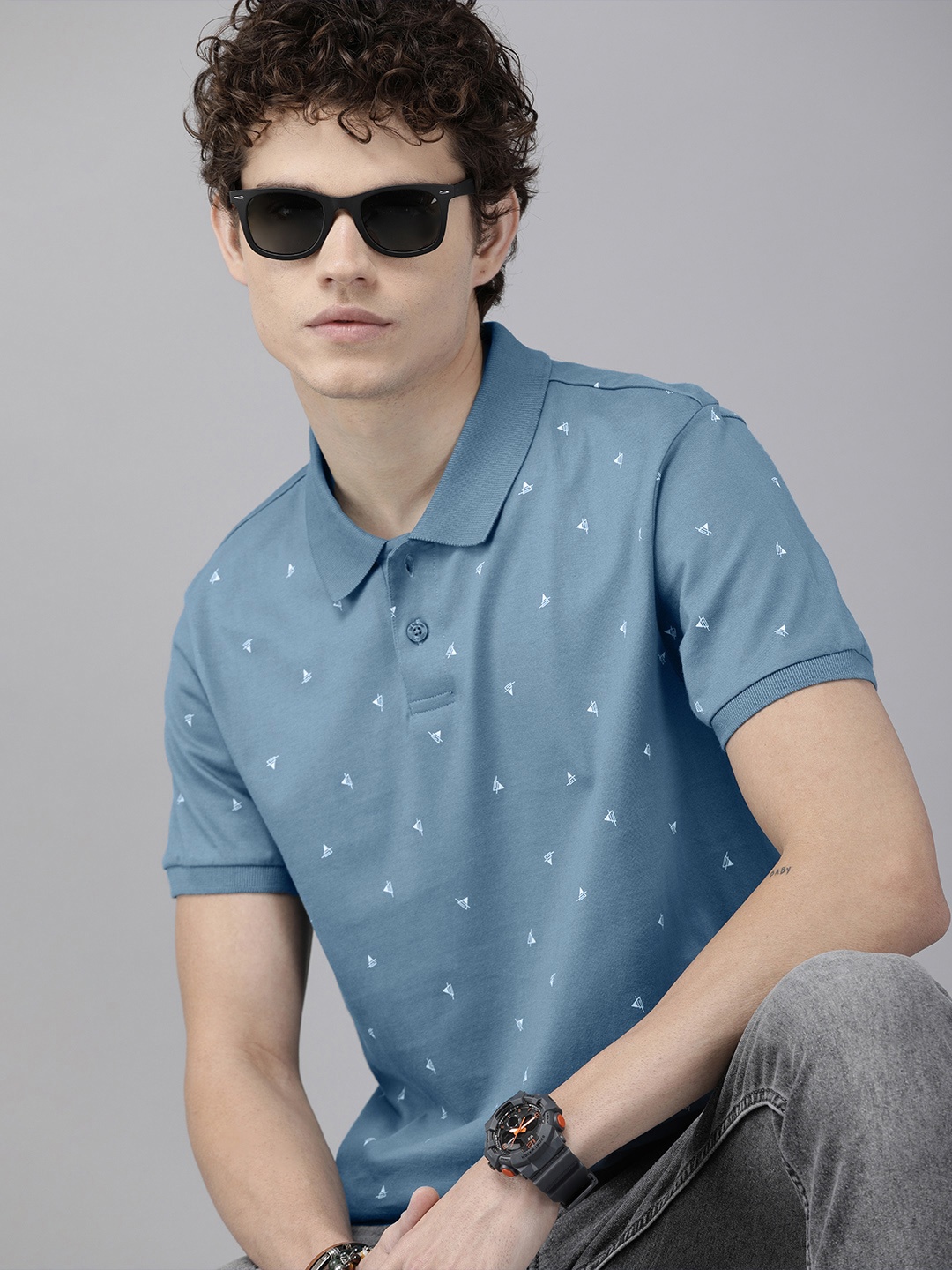

The Roadster Lifestyle Co. Men Blue & White Striped Polo Collar Pure Cotton T-shirt