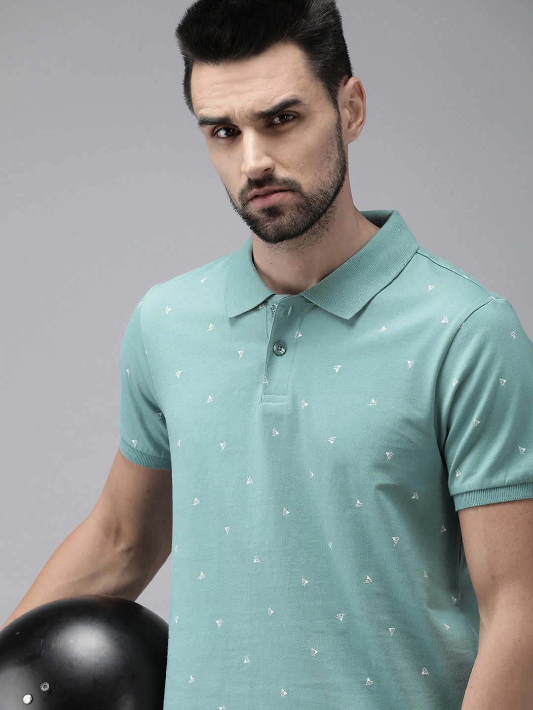 

The Roadster Lifestyle Co Men Sea Green Printed Pure Cotton Polo Collar T-shirt