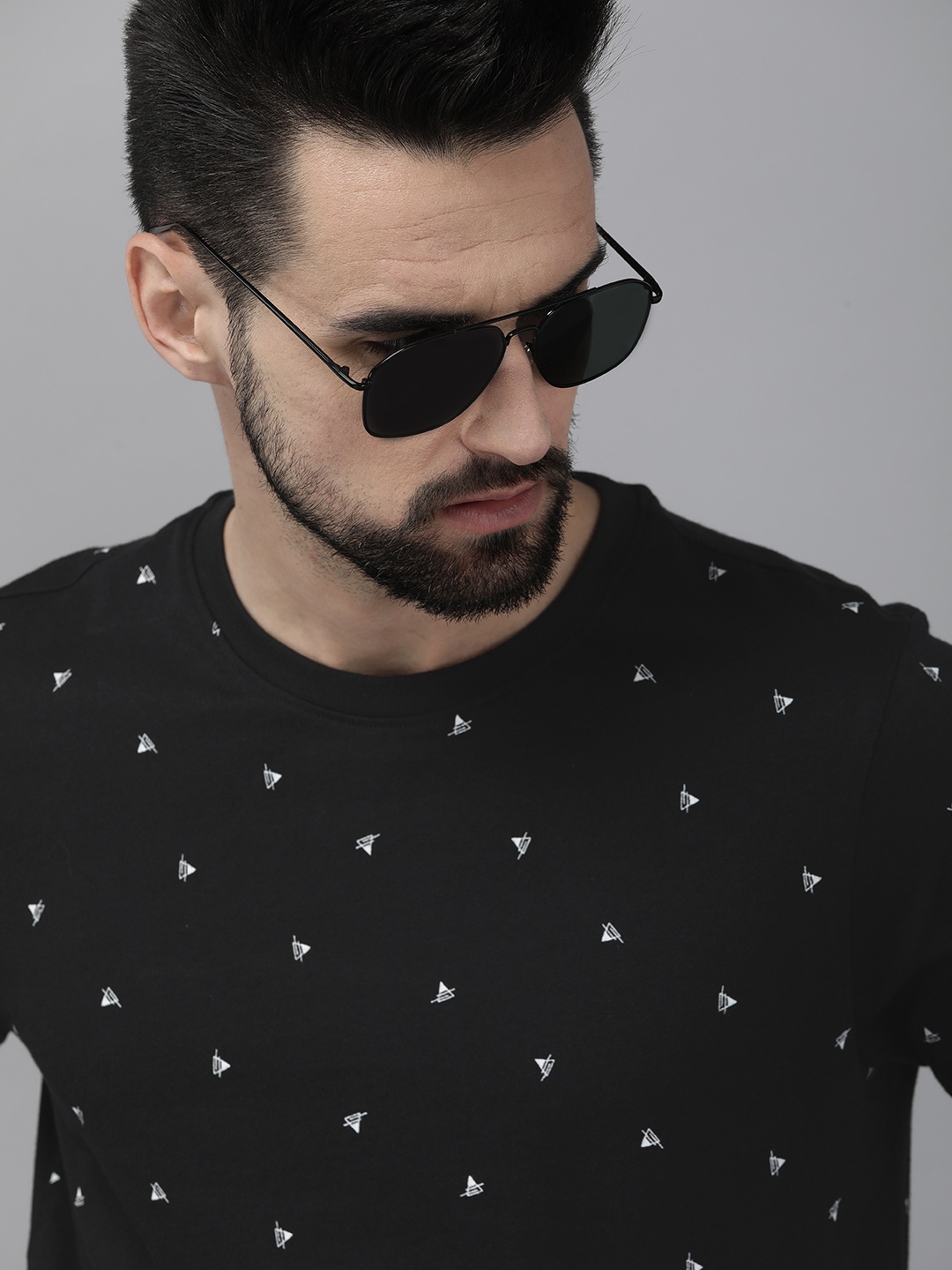 

Roadster Men Black & White Printed Round Neck T-shirt
