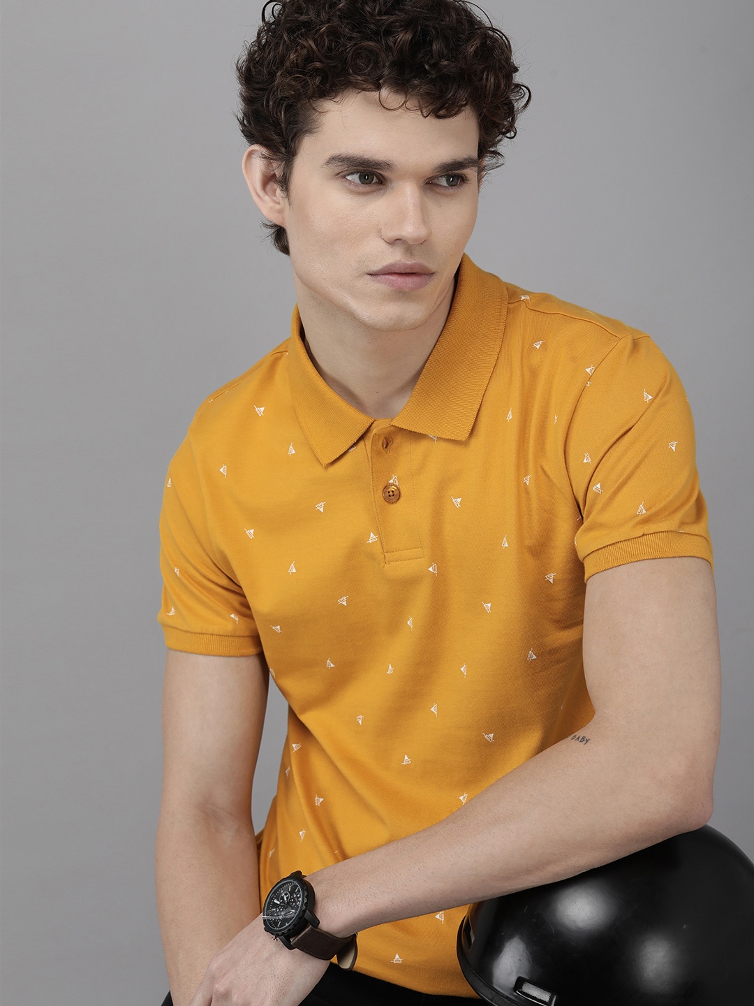 

Roadster Men Mustard Yellow & White Printed Polo Collar T-shirt