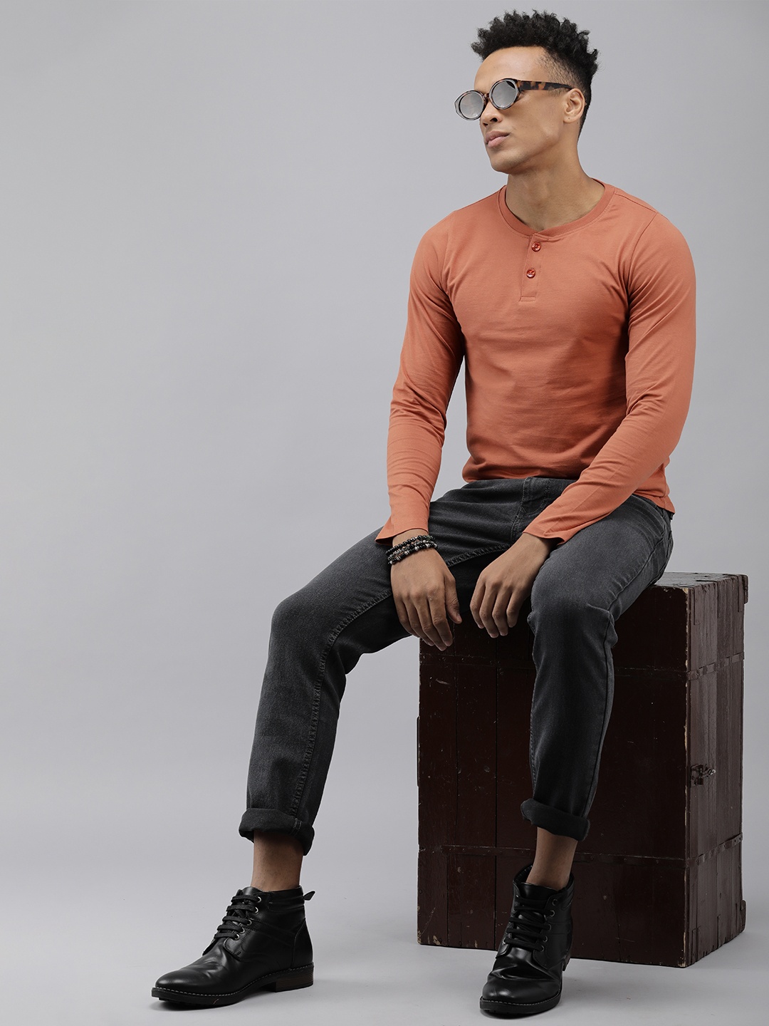 

The Roadster Lifestyle Co Men Orange Shaped Fit Henley Neck T-shirt