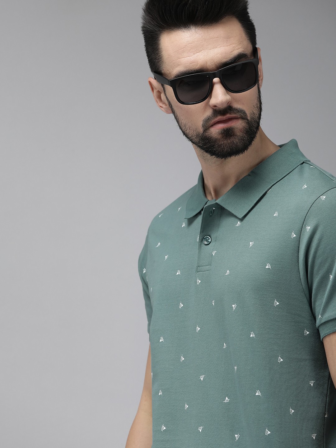

The Roadster Lifestyle Co Men Green & White Printed Polo Collar Pure Cotton T-shirt