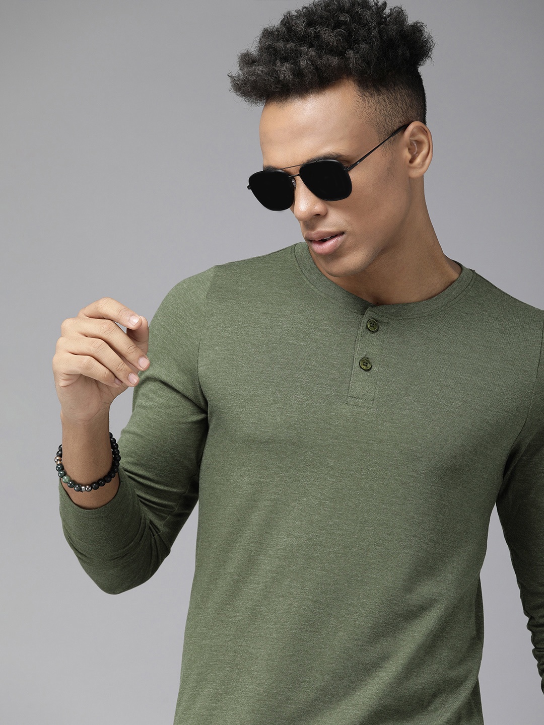 

The Roadster Lifestyle Co Men Olive Green Solid Henley Neck Casual T-shirt