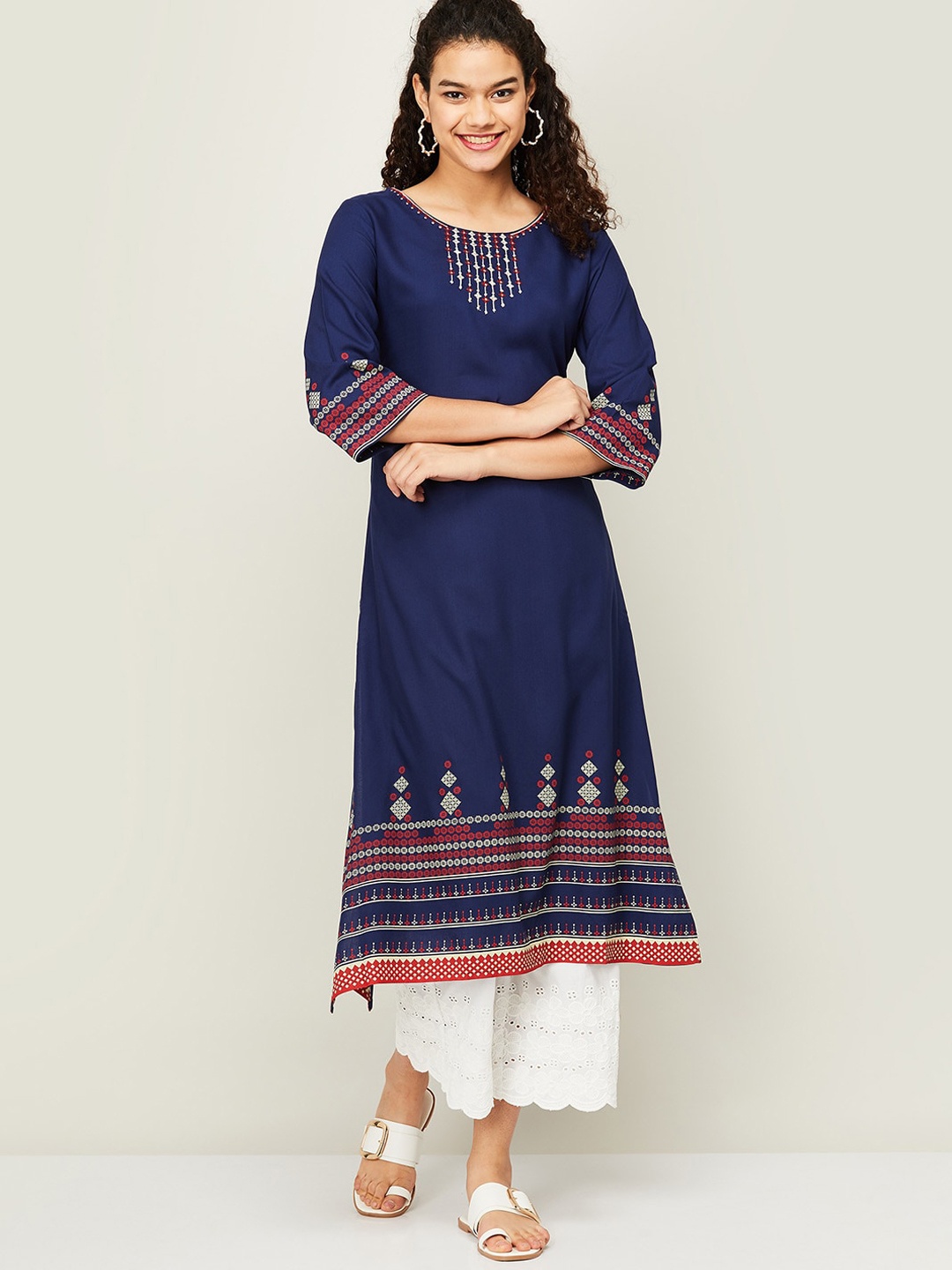 

Melange by Lifestyle Women Navy Blue Ethnic Motifs Yoke Design Flared Sleeves Thread Work Kurta